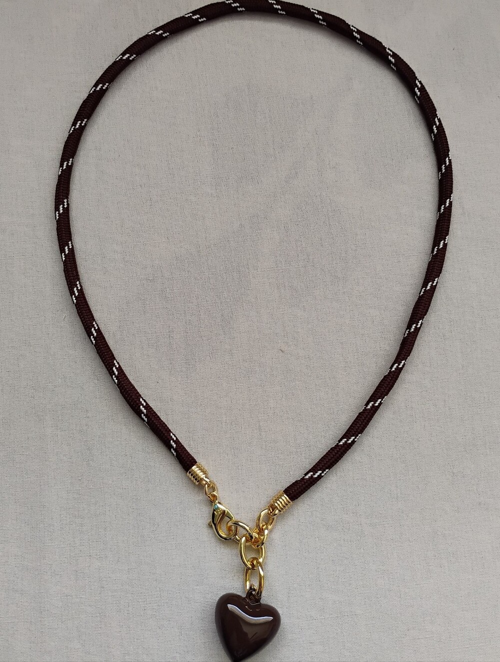 Roxanne Assoulin Brown Cord Necklace with Gold Heart Pendant - Picture 2 of 3